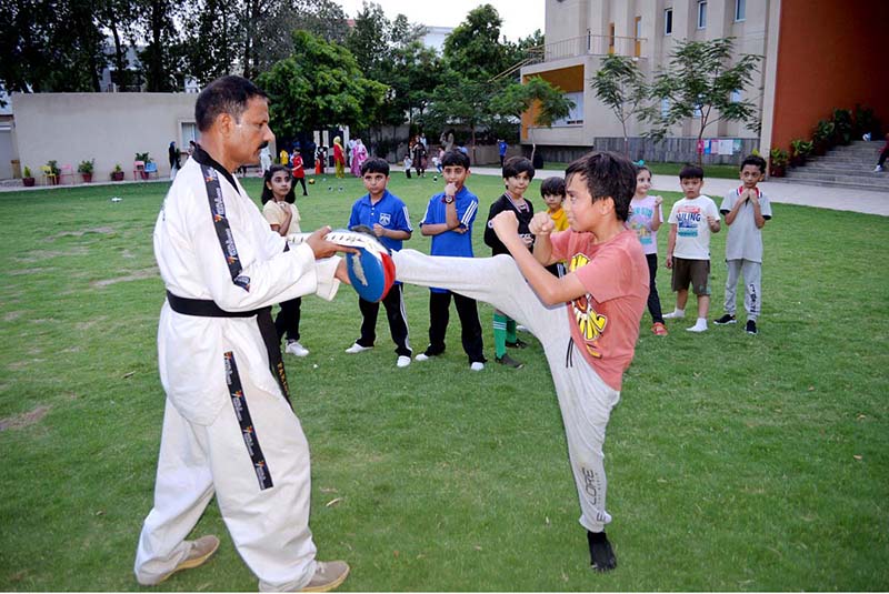 Student in action in karate class during summer camp at Foundation Public School Defense Campus