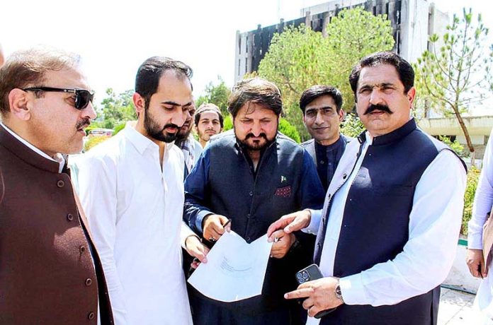 Federal Minister for Overseas Pakistani & Human Resource Development, Mr. Sajid Hussain Turi distributing motorcycles in the affectees of Radio Pakistan Peshawar Incident