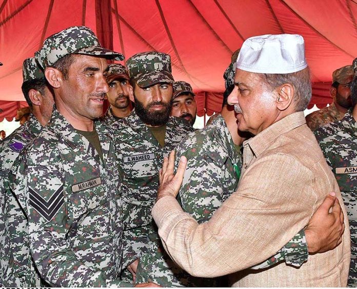 Prime Minister Muhammad Shehbaz Sharif interacts with soldiers on the occasion of Eid ul Adha in Parachinar, Khyber Pakhtunkhwa
