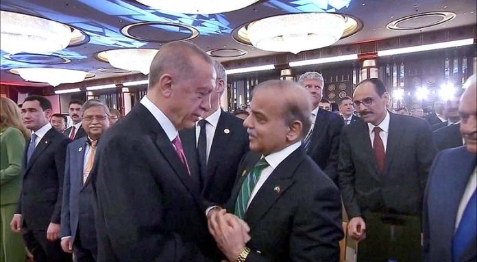 Prime Minister Muhammad Shehbaz Sharif greets Turkish President Recep Tayyip Erdogan at his inauguration ceremony