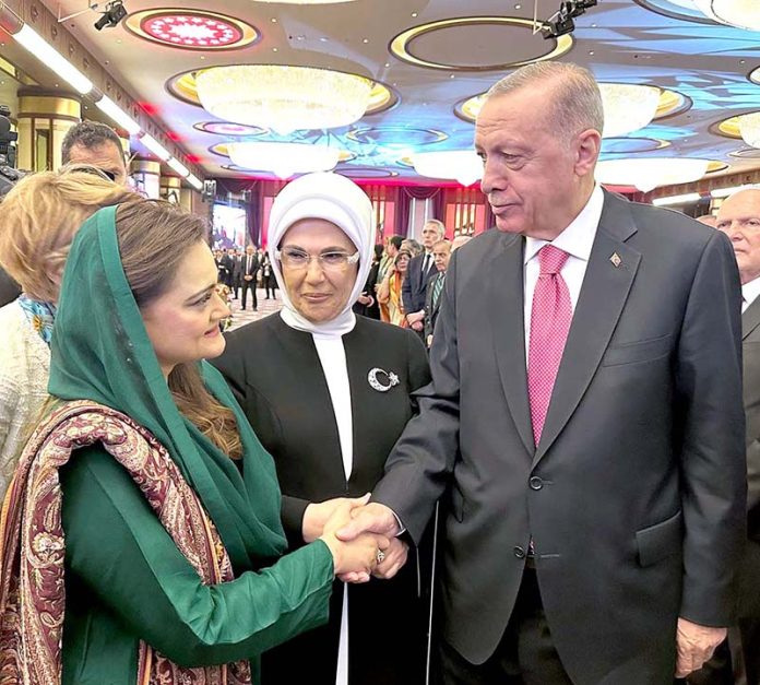Federal Minister for information and Broadcasting, Marriyum Aurangzeb greets Turkish President Recep Tayyip Erdogan at his inauguration ceremony
