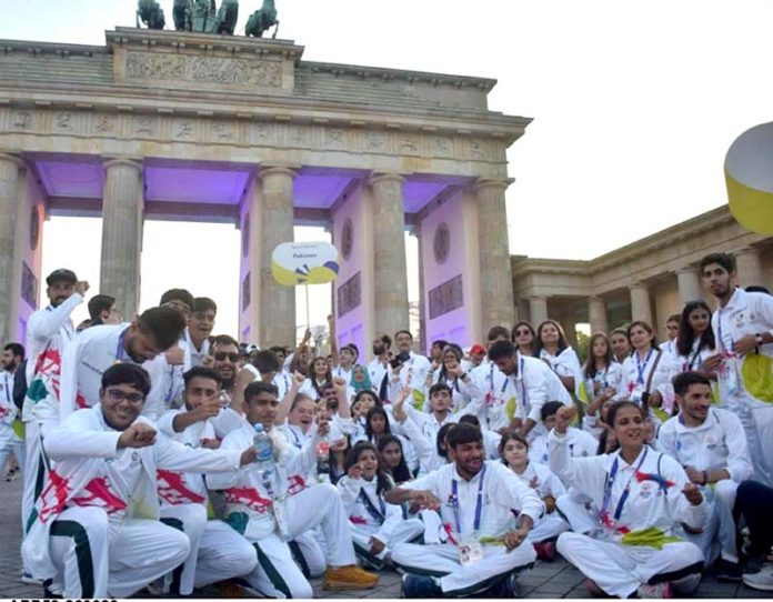 Participants of the 16th Special Olympic World Games Pakistan athletes in a group photo after the closing ceremony at Brendenburg Gate