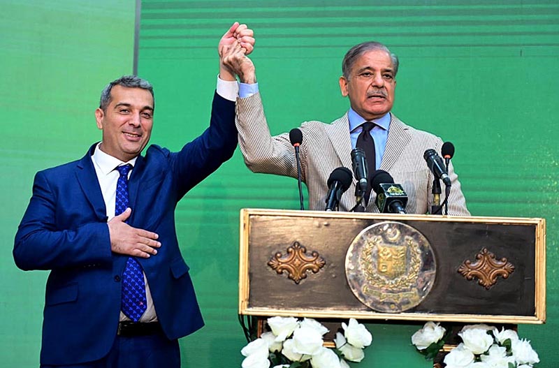 As a token of appreciation and to thank the people and Government of Azerbiajan for hosting Prime Minister Muhammad Shehbaz Sharif and his delegation last week, the Prime Minister is holding hand of the Ambassador of Azerbaijan to Pakistan H.E. Khazar Farhadov during a ceremony