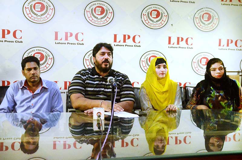 Chairman Pakistan Sports Council of Persons with Disabilities Aghaz Hasan along with others addressing a press conference at Press Club