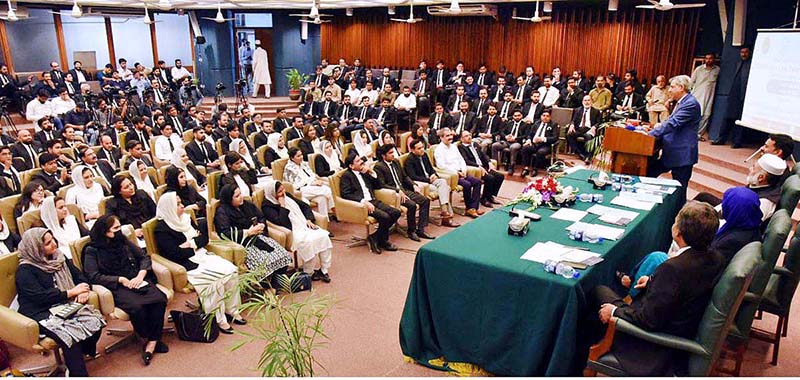 Federal Minister for Law and Justice, Senator Azam Nazir Tarar addressing the participants at the opening ceremony of Islamic Law orientation course for the lawyers of Islamabad organized by Federal Shariat Academy in collaboration with Islamabad Bar Association