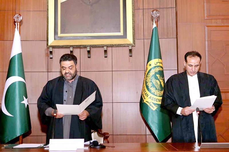 Minister Finance Gilgit-Baltistan Javad Manwa administering oath to newly elected Speaker Gilgit-Baltistan Assembly Nazir Ahmad Advocate during the 4th sitting of 19th session of GB Assembly at Assembly Secretariat