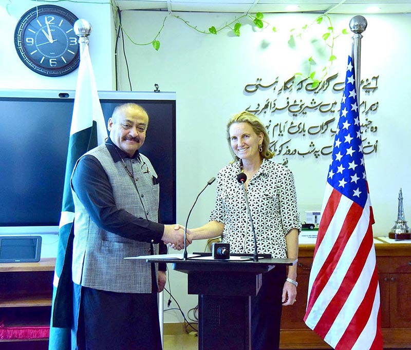 Federal Minister of National Health Services Abdul Qadir Patel Shaking hands with Ms. Isobel Coleman USAID Deputy Administrator