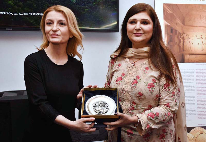 Ambassador of Republic of Bulgaria to Pakistan Ms. Irena Gancheva presenting souvenir to Secretary for National Heritage and Culture of Federal Government of Pakistan Farina Mazhar during inauguration ceremony of photo exhibition titled “Bulgarian Sites on the UNESCO World Heritage List” at Embassy of Bulgaria