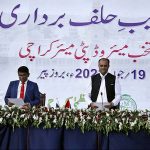 Provincial Election Commissioner Sindh Aijaz Anwar Chohan administering oath to Deputy Mayor of Karachi Salman Abdullah Murad at Gulshan-e-Jinnah (Polo Ground)