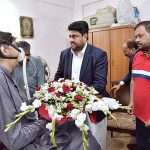 Governor Sindh Kamran Tessori inquiring about the health of tallest man of Pakistan Naseer Soomro