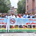 Commissioner Silwat Saeed along with Deputy Commissioner Ali Anan Qamar participating in an awareness walk in connection with World Anti Dengue Day at Municipal Corporation
