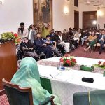 Governor Sindh Kamran Khan Tessori addressing during Prime Minister Electric Wheel Chairs Scheme distribution ceremony for the differently abled university students at Governor House
