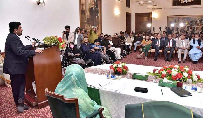 Governor Sindh Kamran Khan Tessori addressing during Prime Minister Electric Wheel Chairs Scheme distribution ceremony for the differently abled university students at Governor House