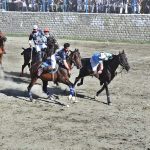 Players from NLI and GB Scouts teams in action during the final match of Jashn-e-Baharan Freestyle Polo Tournament at Aga Khan Shahi Polo Ground