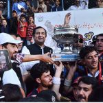 Chief Minister Gilgit-Baltistan Khalid Khurshid Khan giving away winner trophy to team captain of GB Scouts during prize distribution ceremony of Jashn-e-Baharan Freestyle Polo Tournament at Aga Khan Shahi Polo Ground