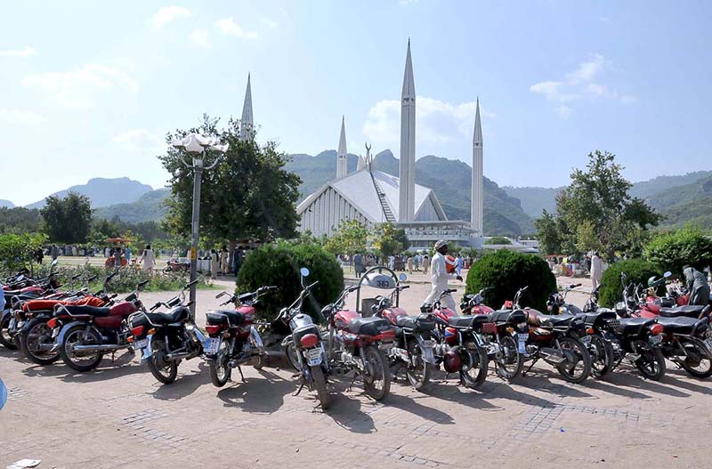 A large number of motorcycles parked in the premises of Shah Faisal Masjid as people visit on weekend