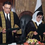 Honorable Chief Justice Mr. Justice Umar Ata Bandial (left) is administering the oath to Justice Supreme Court judge of the Hon’ble Ms. Justice Musarrat Hilali, Chief Justice Peshawar High Court as Judge of the Supreme Court of Pakistan