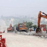 Heavy machinery being used to build new lanes on Islamabad Expressway