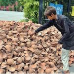 A vendor displaying clay pots (Kujji Thuthi) usually used for distributing food items on the occasion of Muharram ul Haram