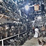 Vendors displaying old vehicles' engines to attract the customers in shop at Chah Sultan