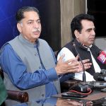 Federal Minister Mian Javed Latif addressing a press conference at PID Media center