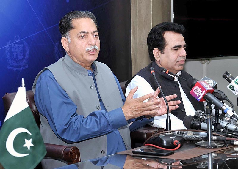 Federal Minister Mian Javed Latif addressing a press conference at PID Media center