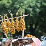 A street vendor displaying dates to attract customers in the Federal Capital.