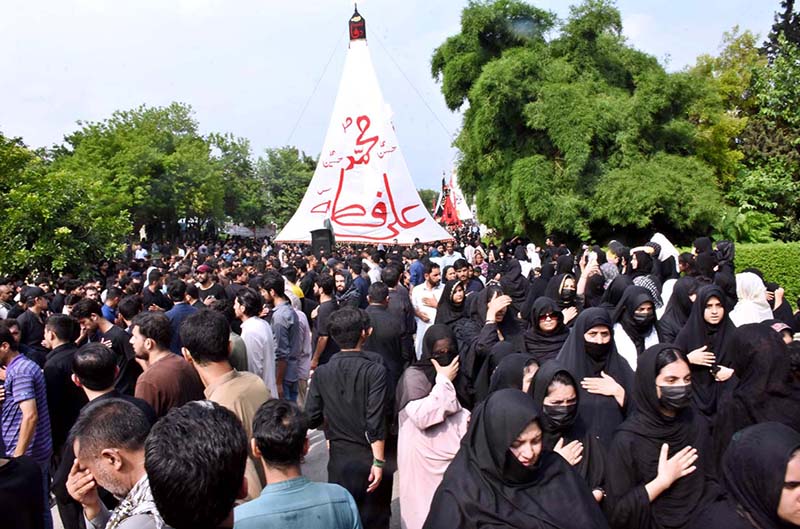 A large number of people attending the main procession of 9th Muharram-ul-Haram observing Youm-e-Ashura at G-6 Road. Muharram ul Harram, the first month of the Islamic calendar is known as the mourning month to pay homage in remembrance of the martyrdom (Shahadat) of Hazrat Imam Hussain (AS), the grandson of the Holy Prophet Mohammad (SAWW), along with his family members and companions at the battle of Karbala