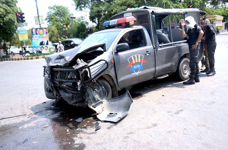 A police mobile van after an accident on Mall Road resulted two personnel seriously injured
