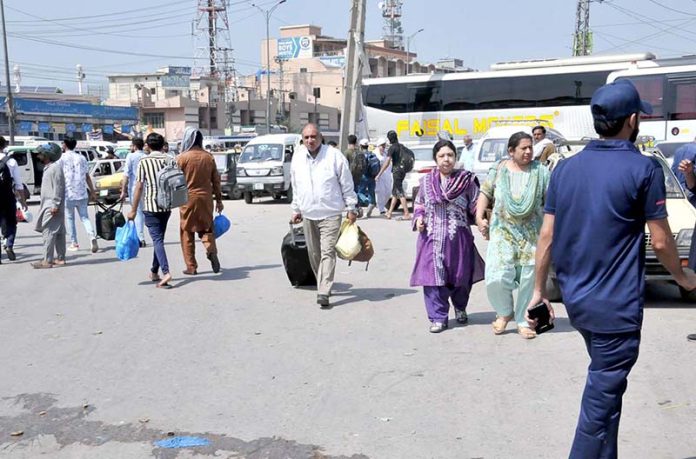 People arriving back to the city after spending Eid holidays with their family members in hometowns