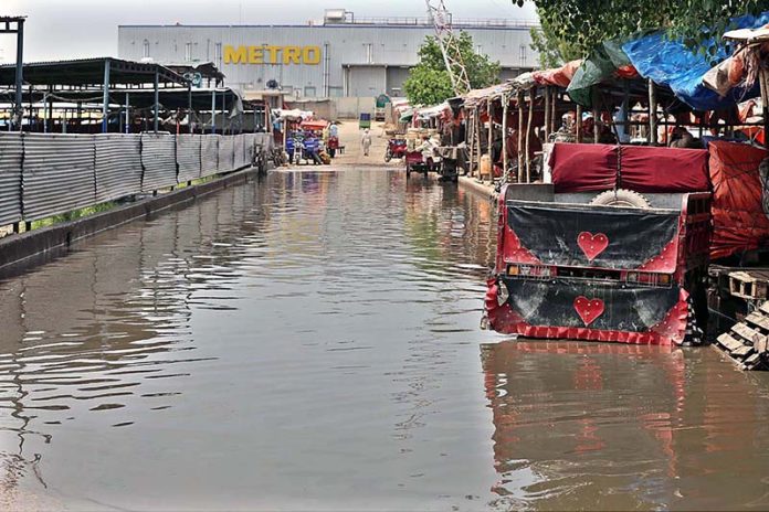 view of stagnant rain water at Fruit and Vegetable market