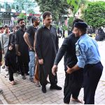 Security personnel checks people at the entrance point to attend the main procession of 9th Muharram-ul-Haram observing Youm-e-Ashura at G-6 Road. Muharram ul Harram, the first month of the Islamic calendar is known as the mourning month to pay homage in remembrance of the martyrdom (Shahadat) of Hazrat Imam Hussain (AS), the grandson of the Holy Prophet Mohammad (SAWW), along with his family members and companions at the battle of Karbala