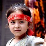 A minor girl attends the 10th Muharram procession to mark Ashoura. Ashoura is the commemoration marking the Shahadat (death) of Hussein(AS), the grandson of the Prophet Muhammad(PBUH), with his family members during the battle of Karbala for the upright of Islam