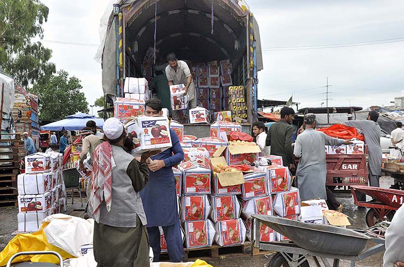 People purchasing fruits at Fruit and Vegetables Market