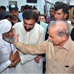 Prime Minister Muhammad Shehbaz Sharif interacts with patients during his visit to Nistar II Hospital