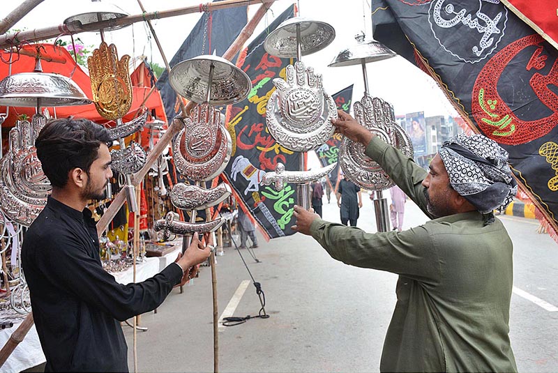 Vendors displaying the Muhrram related stuff to attract the customer at Dhobi Ghat