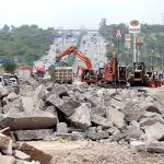 Heavy machinery being used to expand Islamabad Expressway during development in Federal Capital
