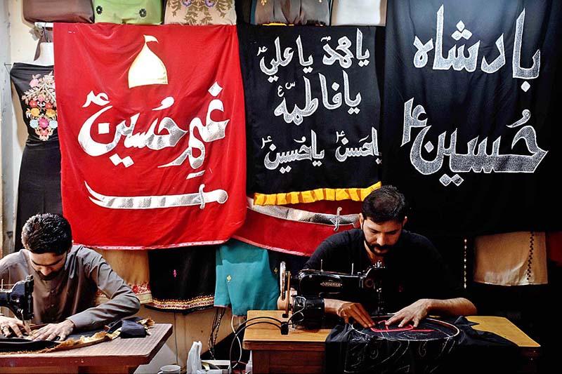 A vendor arranging and displaying the Muharram related stuff during the Holy Month of Muharramul Harram