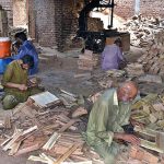 Workers are making wooden box at their work place