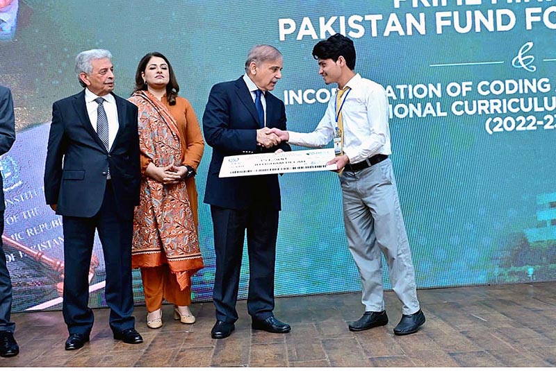 Prime Minister Muhammad Shehbaz Sharif distributes scholarship cheques among high-achieving students on merit basis under the Pakistan Endowment Fund for Education