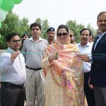 Divisional Commissioner Silwat Saeed and Deputy Commissioner Ali Anan Qamar cutting the ribbon to inaugurate Tree Plantation Campaign at Kaleem Shaheed Park