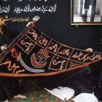 Devotees are preparations for Ashura processions at Agha Mustafa Imambargah
