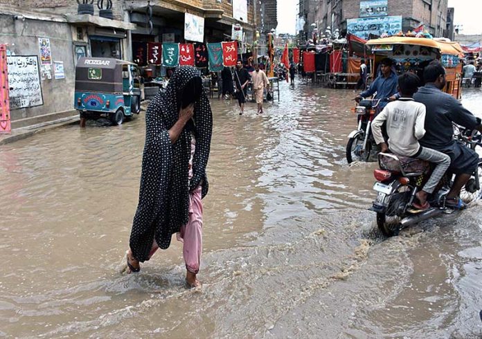 A view of rain water accumulated on the road after heavy rain in the city