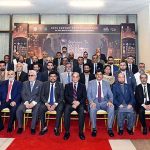 Prime Minister Muhammad Shehbaz Sharif in a group photo with members of Karachi Chamber of Commerce and Industry