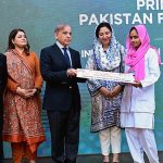 Prime Minister Muhammad Shehbaz Sharif distributes scholarship cheques among high-achieving students on merit basis under the Pakistan Endowment Fund for Education