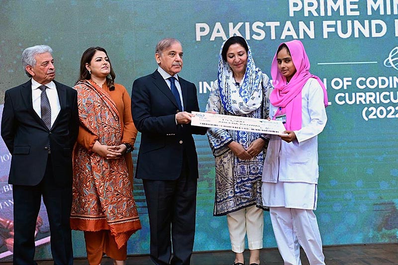 Prime Minister Muhammad Shehbaz Sharif distributes scholarship cheques among high-achieving students on merit basis under the Pakistan Endowment Fund for Education