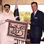 Senator Walid Iqbal, Chairman Senate Standing Committee on Human Rights presenting souvenir made by prisoners of Central Jail Adiala, Rawalpindi to Chairman Senate, Muhammad Sadiq Sanjrani at Parliament House