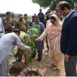 Divisional Commissioner Silwat Saeed and Deputy Commissioner Ali Anan Qamar sapling a plant after inaugurating Tree Plantation Campaign at Kaleem Shaheed Park