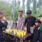 Volunteers distributing sabeel among the participant of the Majlis-e-Aza during the holy month of Muharrum-ul-Haram