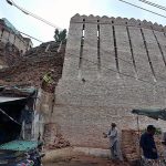 A labour busy in construction work of Pakka Fort